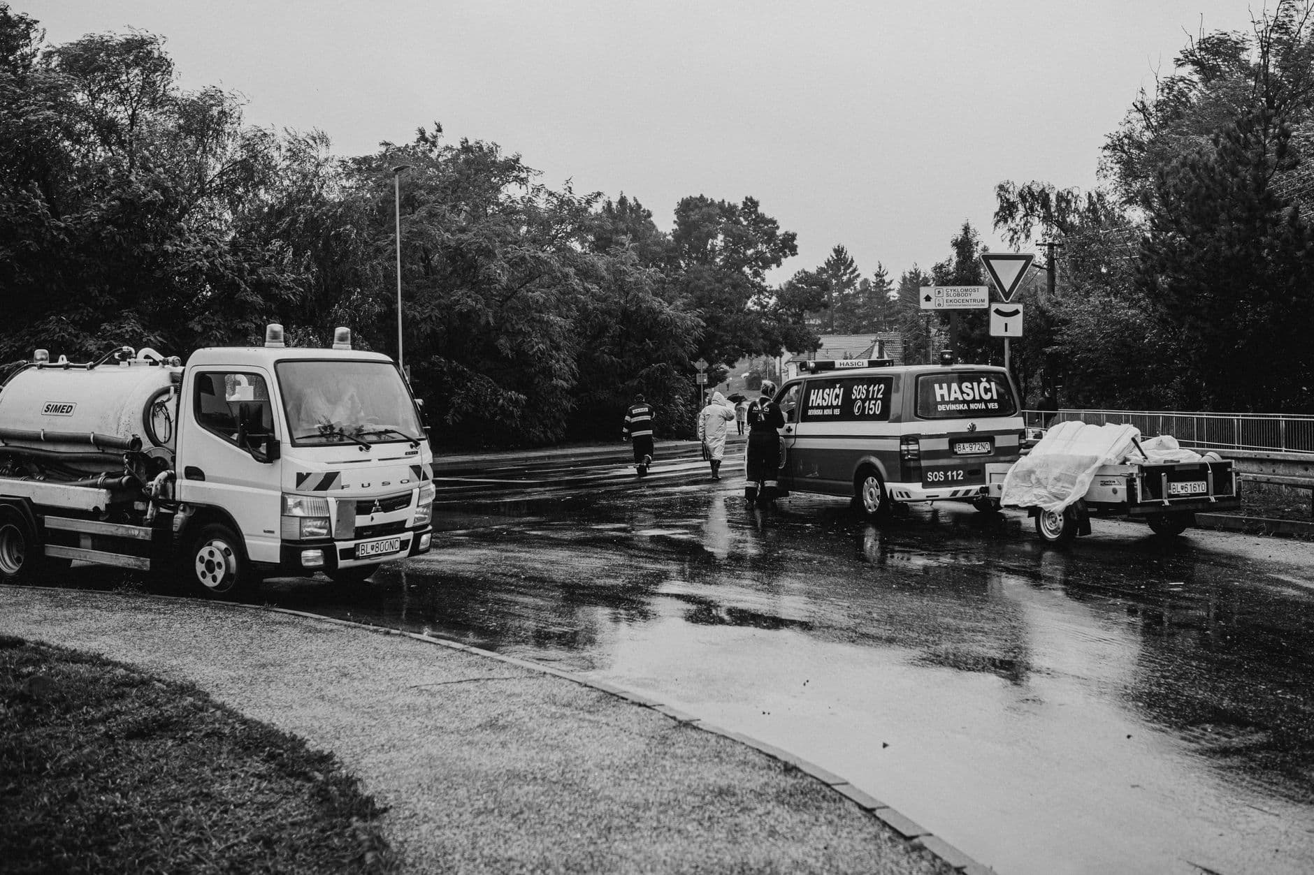 Image illustrating: Emergency vehicles and festival evacuation near a wooded cultural-event site in  (editorial)