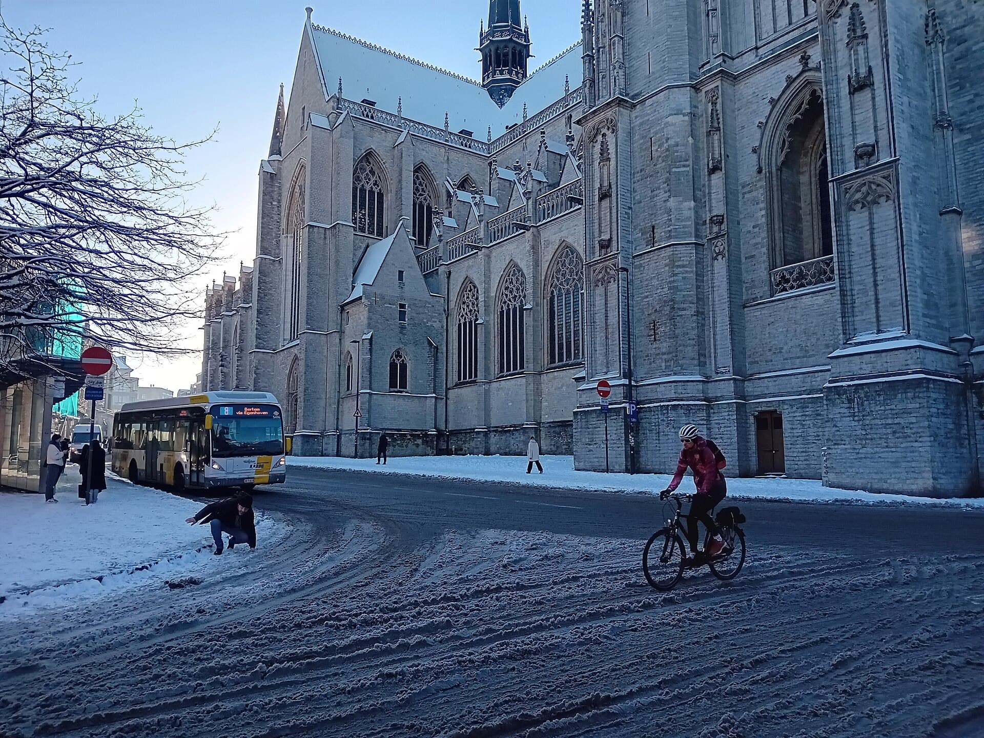 Image illustrating: Exterior of Sint-Geertruikerk in Leuven, focusing on the Gothic tower and church (editorial)