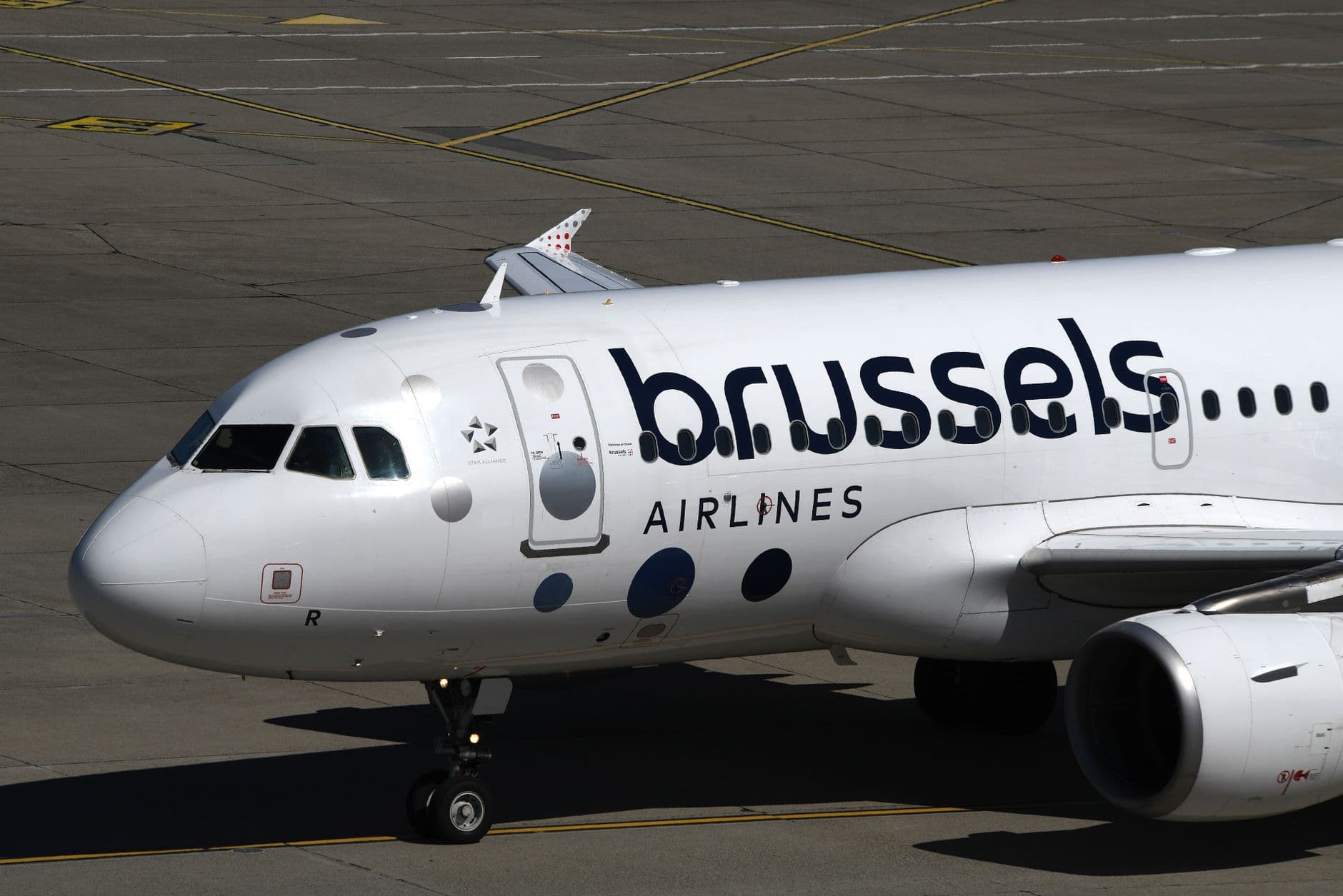 Image illustrating: LATAM or Brussels Airlines aircraft at Brussels Airport terminal (editorial)
