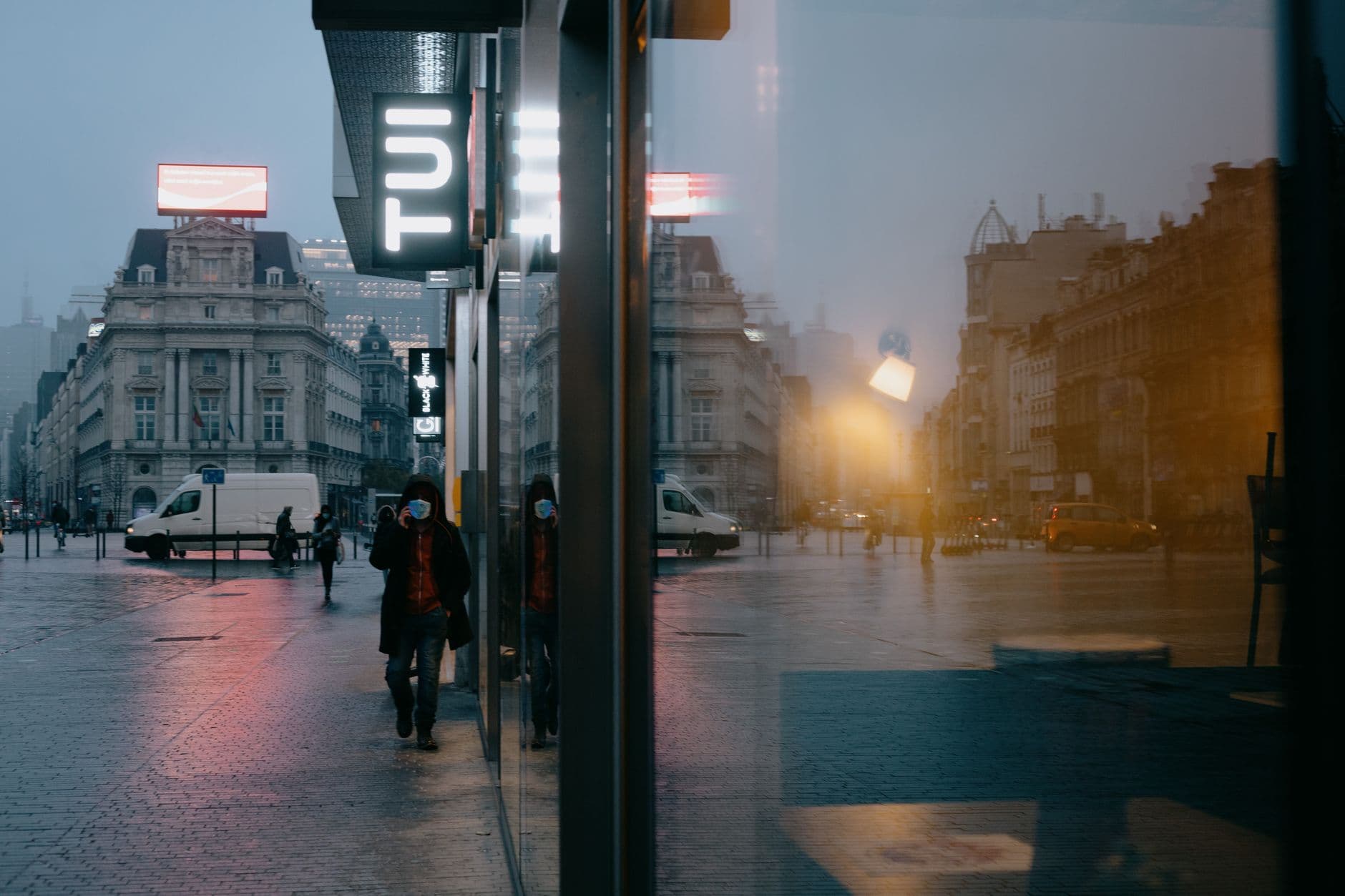 Image illustrating: Police and commuters outside Brussels Central Station during an evening public-o (editorial)