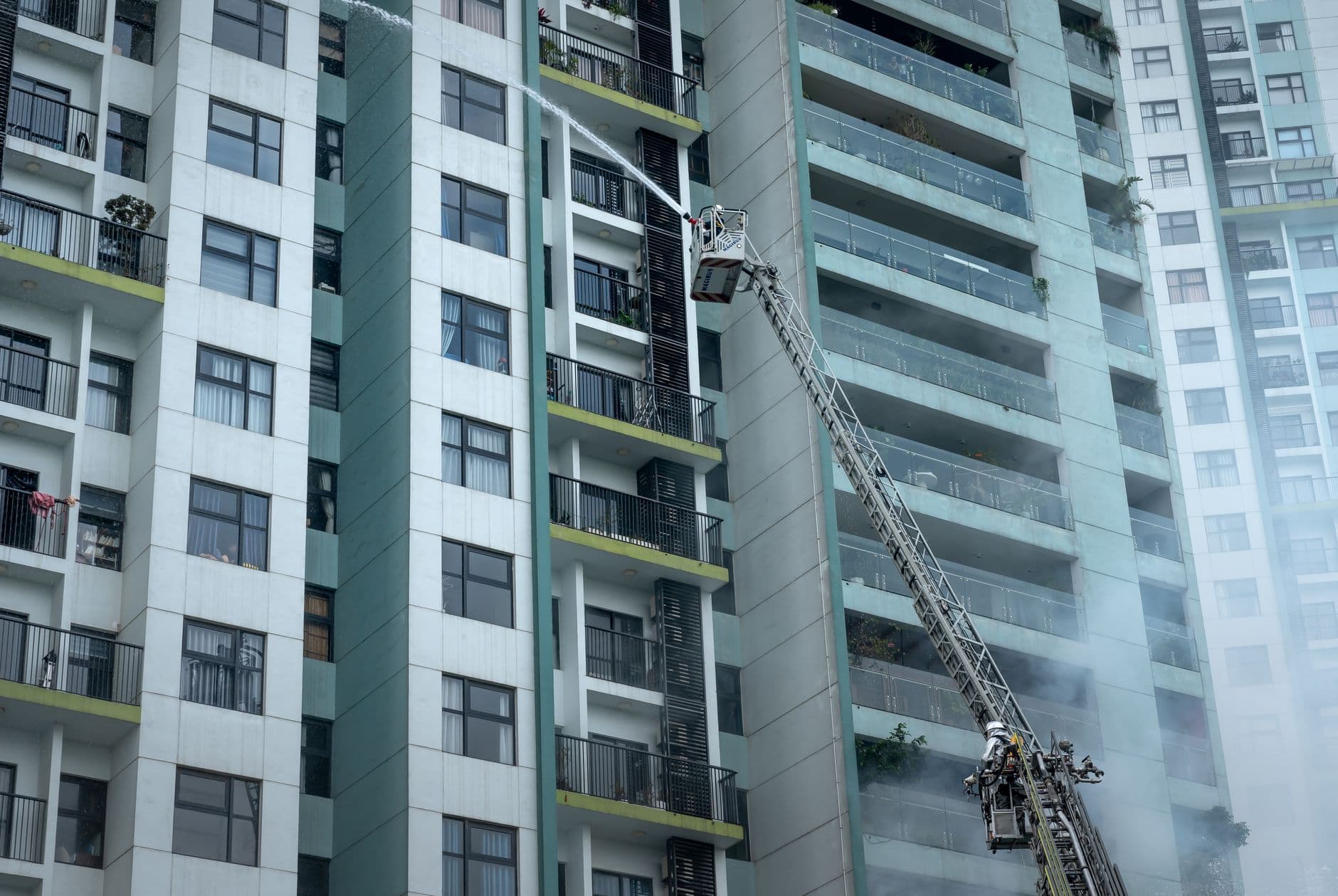 Image illustrating: Firefighters outside a residential apartment building in Verviers (editorial)