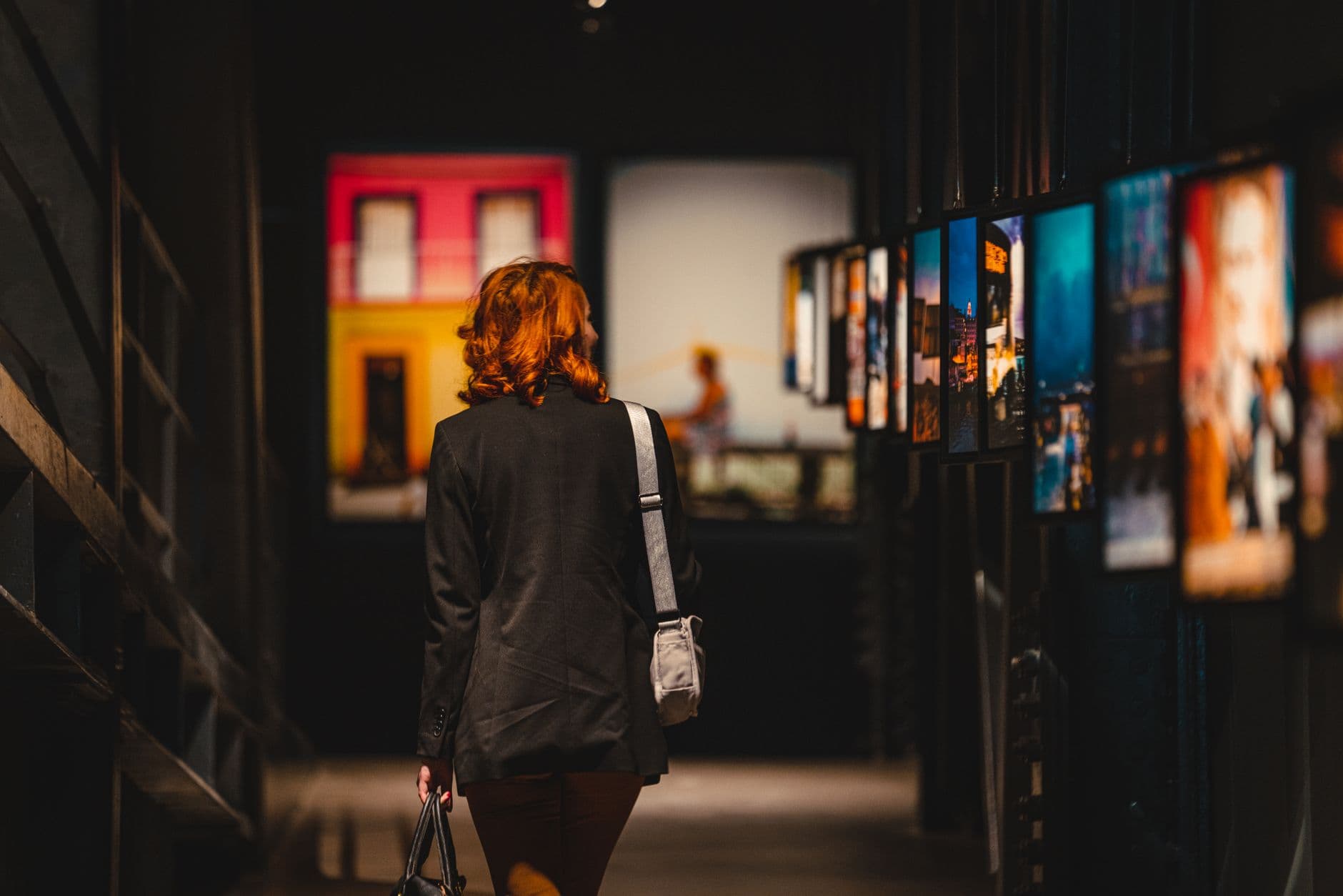 Image illustrating: Visitors entering the Seuls exhibition at the Comic Art Museum in Brussels (editorial)